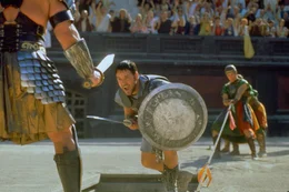 Der r&ouml;mische Feldherr Maximus (Russell Crowe, M.) soll Nachfolger von Kaiser Marcus Aurelius werden. Um dies zu verhindern, ordnet dessen Sohn die Exekution von Maximus an. Ihm gelingt zwar die Flucht, doch er muss sich fortan als Gladiator verdingen ...