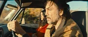 L-R: Leo (Javier Bardem), Dolores (Salma Hayek)