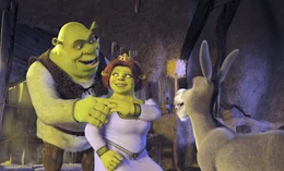 Als nach den Flitterwochen Fionas Eltern zum Vorstellungstermin bitten, machen sich Fiona, M. und Shrek, l. auf ins K&ouml;nigreich "Weit Weit Weg" - nat&uuml;rlich in Begleitung des dauernd plappernden Esels Donkey, r. ...