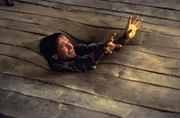 Schwierig, zu w&uuml;rfeln, wenn man gerade vom Fu&szlig;boden verschluckt wird: Alan (Robin Williams) in h&ouml;chster Not ...