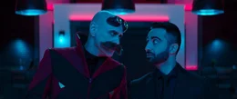 l-r: Dr. Ivo Robotnik (Jim Carrey), Agent Stone (Lee Majdoub)