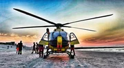 Der Rettungshubschrauber im Einsatz am Strand von Wangerooge Der Rettungshubschrauber im Einsatz am Strand von Wangerooge