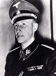 F&uuml;r die Nazis der perfekte Nationalsozialist: SS Obergruppenf&uuml;hrer Reinhard Heydrich (1904-1942) sa&szlig; am 20.01.1942 der Besprechung zur "Endl&ouml;sung der Judenfrage" im G&auml;stehaus der Sicherheitspolizei und des Sicherheitsdienstes, Am Gro&szlig;en Wannsee 56-58 in Berlin vor. (Foto: 1940)