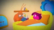 Fins Papa (links) liest Maari (rechts) eine Gute-Nacht-Geschichte vor.