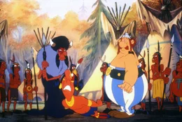 Obelix (re.) verlangt von dem Indianerdorf die Freilassung Miraculixs.