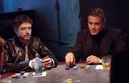 On the right: George Clooney as Danny Ocean.