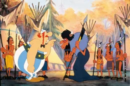 Obelix (li.) verlangt von dem Schamenen die Freilassung Miraculixs.