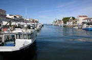 Das in der Camargue gelegene Le Grau-du-Roi empfängt seit seiner Gründung Ende des 19. Jahrhunderts Menschen, die sich sonst keinen Urlaub leisten könnten. Das in der Camargue gelegene Le Grau-du-Roi empfängt seit seiner Gründung Ende des 19. Jahrhunderts Menschen, die sich sonst keinen Urlaub leisten könnten.