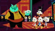 Disneys DuckTales, Das Haus der Gl&uuml;cklichen F&uuml;gung. Die Ducks erhalten einen Hilferuf von Gustav Gans, der in einem Casino in Asien residiert.