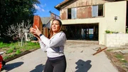 Host Page Turner is captured working by taking the pieces of the deconstructed garage to the trash, as seen on Fix My Flip, Season Two. Host Page Turner is captured working by taking the pieces of the deconstructed garage to the trash, as seen on Fix My Flip, Season Two.