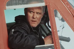 Eric Qualen (John Lithgow)