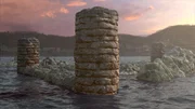 As the sea recedes it reveals the remains of stone columns and walls of the buildings of ancient Baiae which have been submerged beneath the sea.