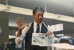 William Somerset (Morgan Freeman)