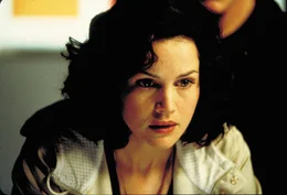 T.K. Law/ Massie Walsh (Carla Gugino)