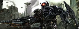 Shockwave (Bild) ist inzwischen doppelt gef&auml;hrlich, weil er &uuml;ber ein Haustier verf&uuml;gt, einen riesigen wurm&auml;hnlichen Roboter ...