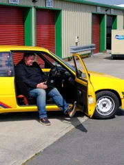 Mike in Peugeot 205 on a call to buyer. Mike in Peugeot 205 on a call to buyer.