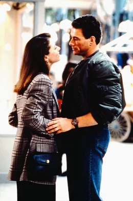Melissa (Mia Sara, l.) offenbart Max (Jean-Claude Van Damme), dass sie schwanger ist!