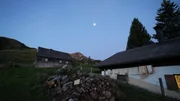 Landschaftsaufnahme Sonnenaufgang / Mond am Himmel überm Bregenzer Wald beim Senner Anton Sutterlüty Landschaftsaufnahme Sonnenaufgang / Mond am Himmel überm Bregenzer Wald beim Senner Anton Sutterlüty