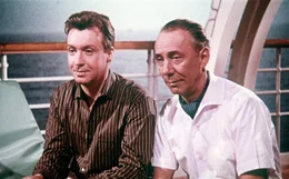L-R: Peter (Peter Alexander) und sein Freund Henri (Rudolf Platte) tr&auml;umen ein wenig von 1001 Nacht.