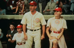 Jimmy Dugan (Tom Hanks, l.); Dottie Hinson (Geena Davis, r.)