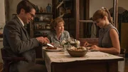 l-r: Andr&eacute; Fauvel (Lucas Bravo), Ada Harris (Lesley Manville), Natasha (Alba Baptista)
