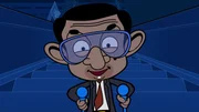 Auf Skiern rutscht Mr. Bean die Rolltreppe runter, weil er gemeinsam mit dem Sack voller Schmuck vor dem Einbrecher fliehen muss. Auf Skiern rutscht Mr. Bean die Rolltreppe runter, weil er gemeinsam mit dem Sack voller Schmuck vor dem Einbrecher fliehen muss.
