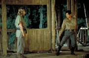 Im Bild: Col. James Braddock (Chuck Norris, l.), Col. Yin (Soon-Teck Oh, r.)