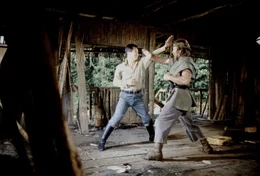 James Braddock (Chuck Norris, r.)