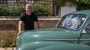 Ant Anstead in black tshirt and jeans, leaning on the morris minor bonnet - partially behind, after the renovation infront of the house with bushes in the background Ant Anstead in black tshirt and jeans, leaning on the morris minor bonnet - partially behind, after the renovation infront of the house with bushes in the background