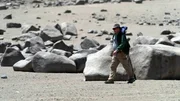 Der Geologe Jay Quade hat das Geheimnis um die polierten Felsen in der Atacama-Wüste durch einen Zufall gelöst. Der Geologe Jay Quade hat das Geheimnis um die polierten Felsen in der Atacama-Wüste durch einen Zufall gelöst.