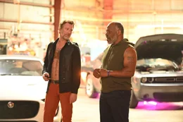 L - R: Dante (Thomas Jane), Roach (Mike Tyson)