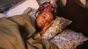 Lynne Michelle (Faith) lays in bed. Lynne Michelle (Faith) lays in bed.