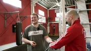 Jean (li.) mit dem Boxtrainer