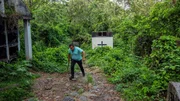 Person walking through Cemetery in Armero Person walking through Cemetery in Armero