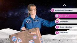 Astronautin Insa Thiele-Eich mit Koffer. Astronautin Insa Thiele-Eich mit Koffer.
