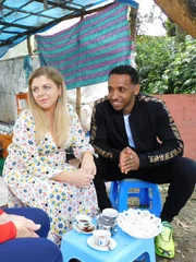 Ari and Bini have coffee with Ari’s mom in Ethiopia. Ari and Bini have coffee with Ari’s mom in Ethiopia.