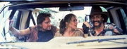 L-R:  Michael Douglas (Jack Colton)., Joan Wilder (Kathleen Turner), Juan (Alfonso Arau)