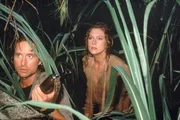 Michael Douglas (Jack Colton), Kathleen Turner (Joan Wilder).