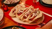 Beauty shot of Molly Yeh's Lefse Hot Dogs with Fennel Slaw, as seen on Girl Meets Farm, season 7. Beauty shot of Molly Yeh's Lefse Hot Dogs with Fennel Slaw, as seen on Girl Meets Farm, season 7.