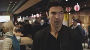 Adam Noshimuri (Ian Anthony Dale).