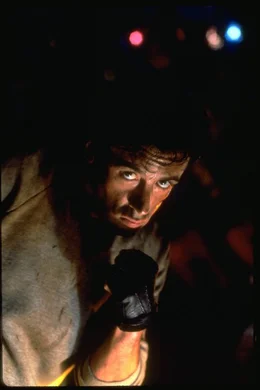 Sylvester Stallone as Rocky Balboa.