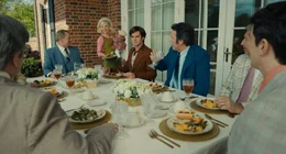 Jessica Chastain (Tammy Faye Bakker), Andrew Garfield (Jim Bakker).