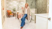 Erin Napier poses inside of the Helveston bathroom, as seen on Home Town, Season 8. Erin Napier poses inside of the Helveston bathroom, as seen on Home Town, Season 8.