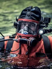 Paul Richardson in water in dive uniform. Paul Richardson in water in dive uniform.