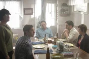 McCrary Family sitting at dinner table and eating during reenactment. McCrary Family sitting at dinner table and eating during reenactment.