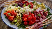 Beauty shot of Molly Yeh's Antipasto Salad w/Prosciutto Wrapped Breadsticks, as seen on Girl Meets Farm, Season 7. Beauty shot of Molly Yeh's Antipasto Salad w/Prosciutto Wrapped Breadsticks, as seen on Girl Meets Farm, Season 7.