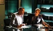 Langston (Laurence Fishburne, left) and Greg (Eric Szmanda) follow a lead in the investigation into the murder of a student at Catherine&rsquo;s daughter Lindsey&rsquo;s school.