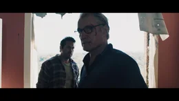 L - R: Mike Wade (Scott Adkins), Richard Ericson (Dolph Lundgren)