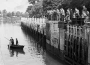 Police searching the river Thames at Teddington Lock with a telescopic 'water glasses' for clues relating to the murder of two teenagers Christine Reed and Barbara Songhurst. Police searching the river Thames at Teddington Lock with a telescopic 'water glasses' for clues relating to the murder of two teenagers Christine Reed and Barbara Songhurst.