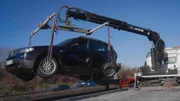 A car is being towed A car is being towed